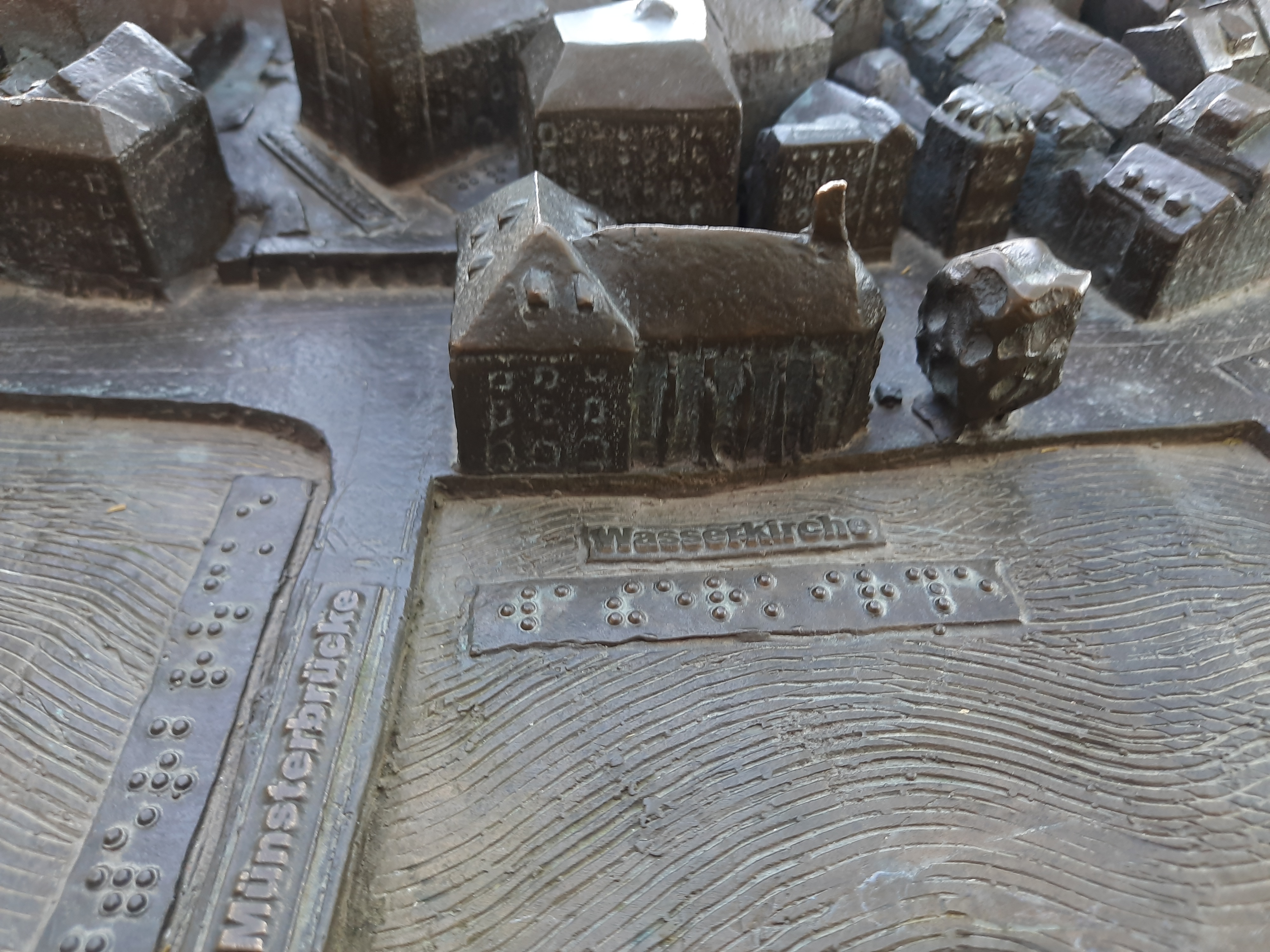 A section of a metallic replica of Zurich with braille